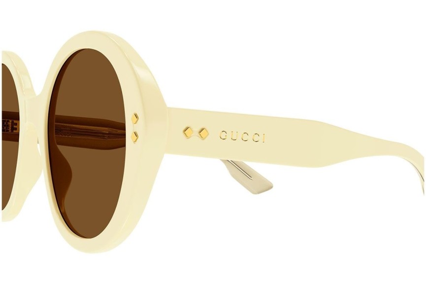 Solglasögon Gucci GG1081S 004 Runda Beige